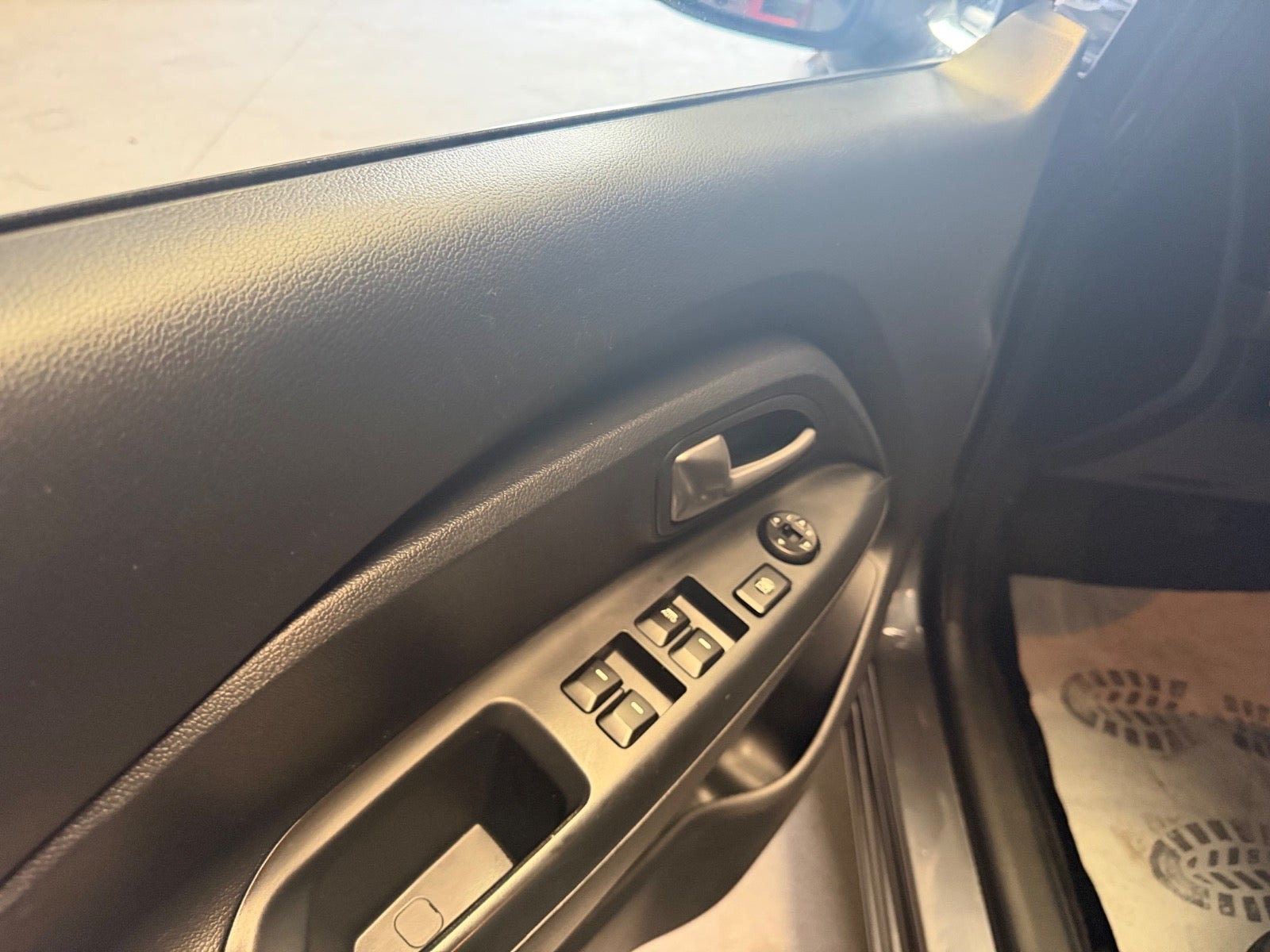 Grå Kia Rio fra 2013