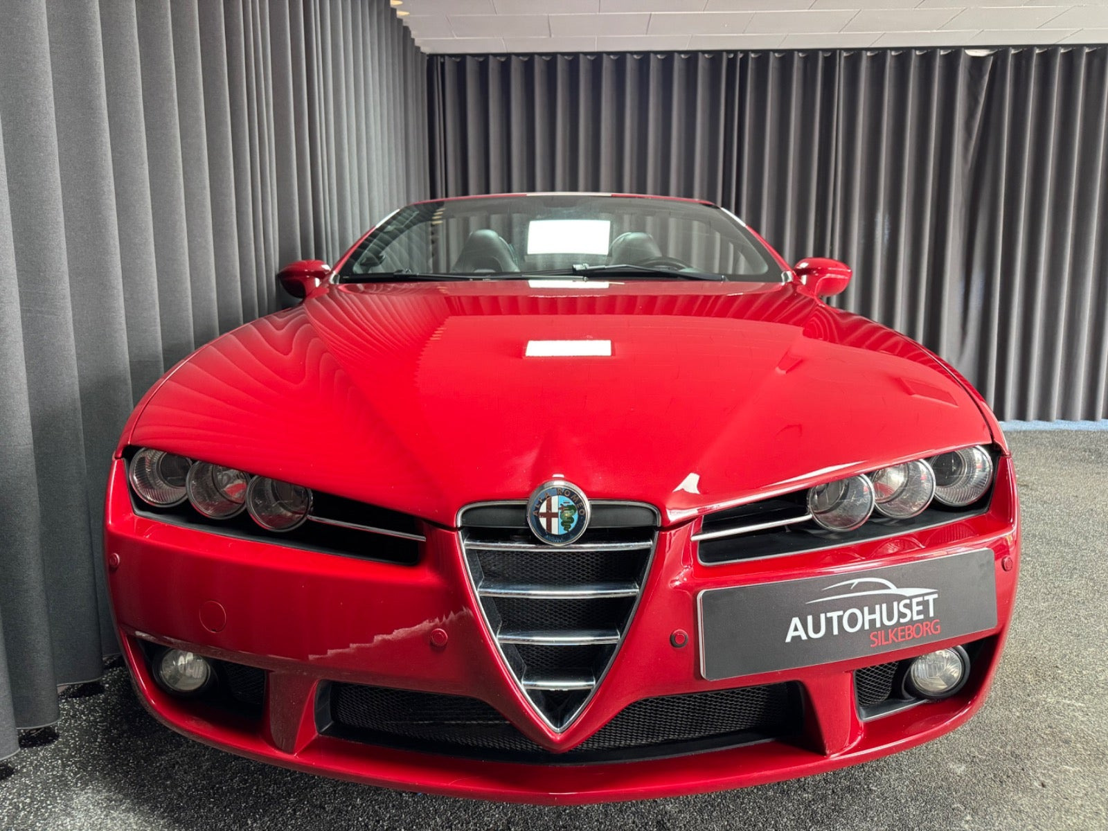 Rød Alfa Romeo Spider fra 2010