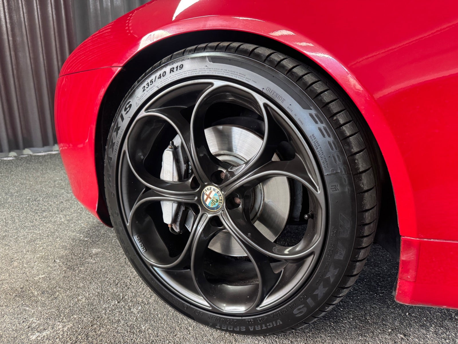 Rød Alfa Romeo Spider fra 2010