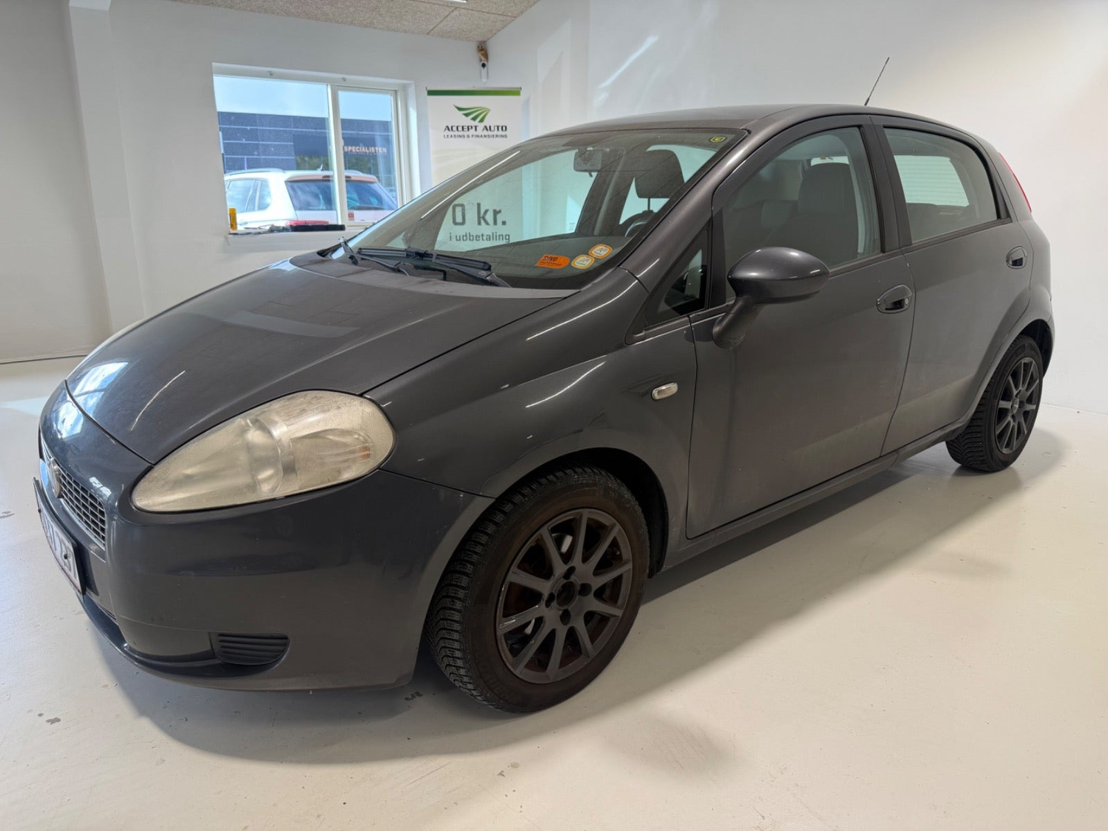 Grå Fiat Punto Evo fra 2009