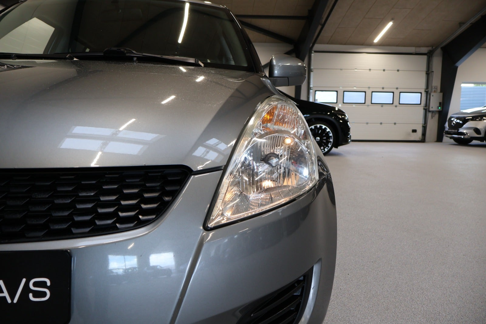 Grå Suzuki Swift fra 2010