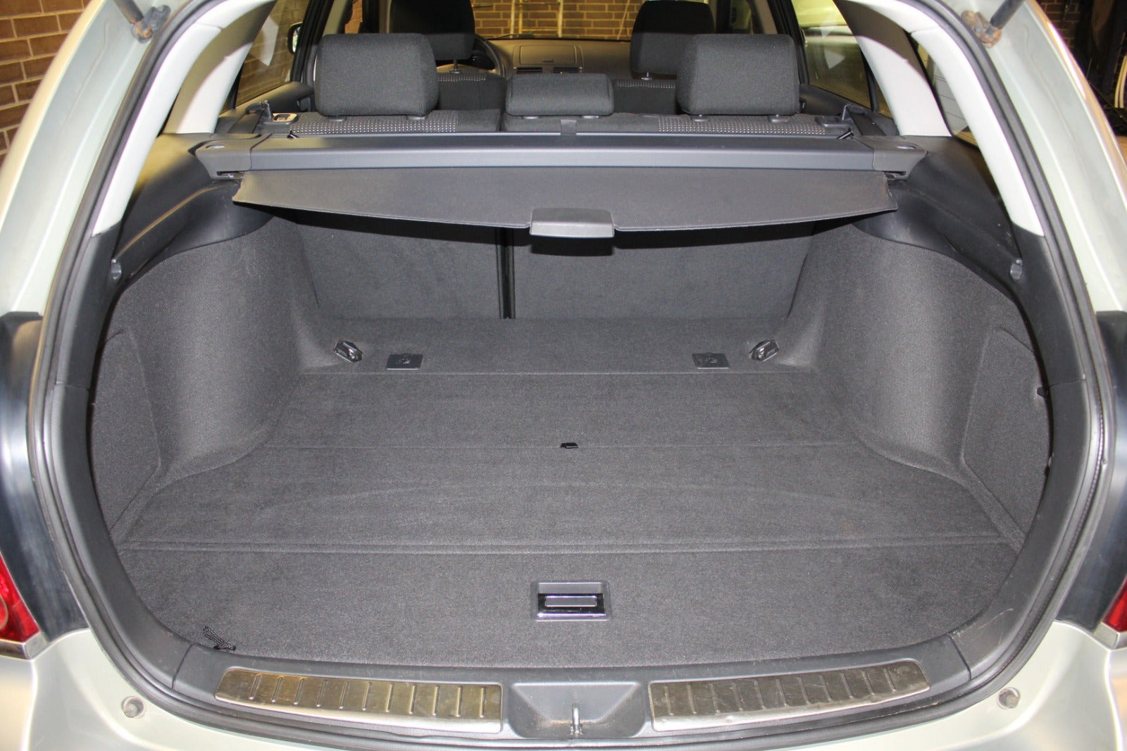 Grøn Toyota Avensis fra 2007