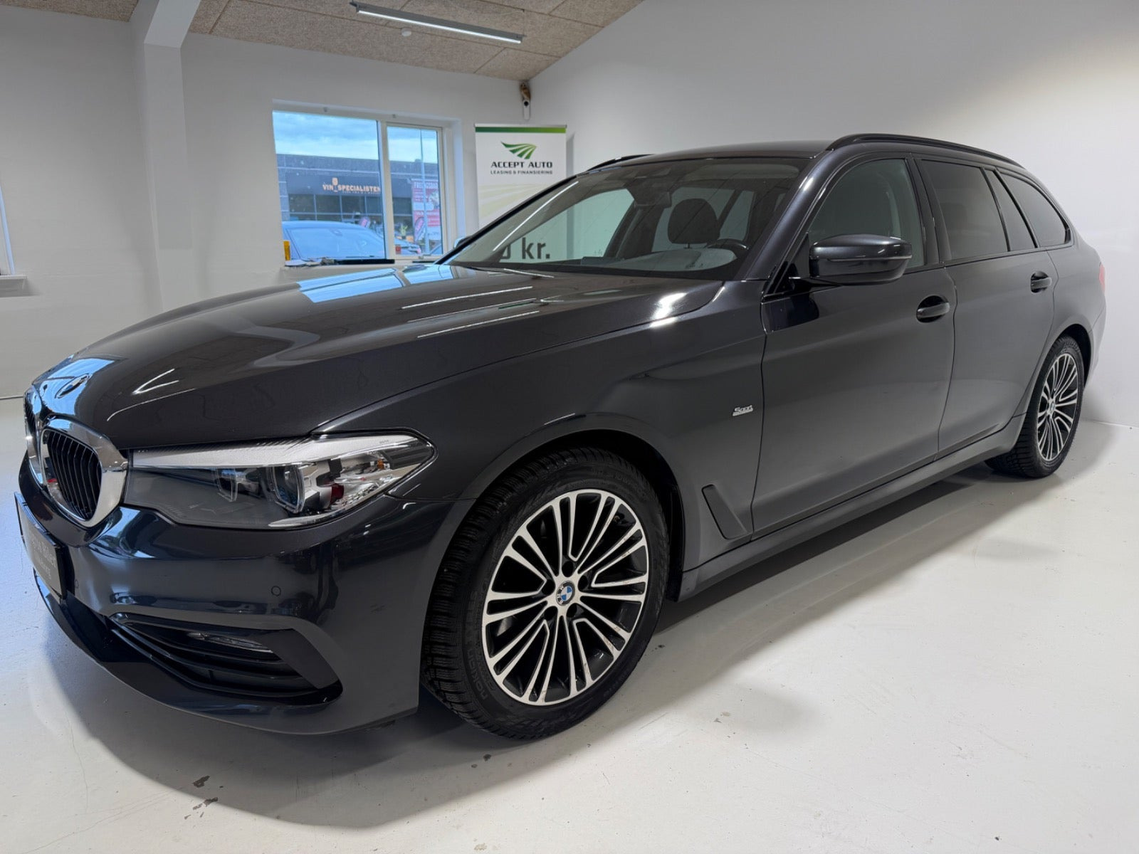 Grå BMW 520d fra 2017