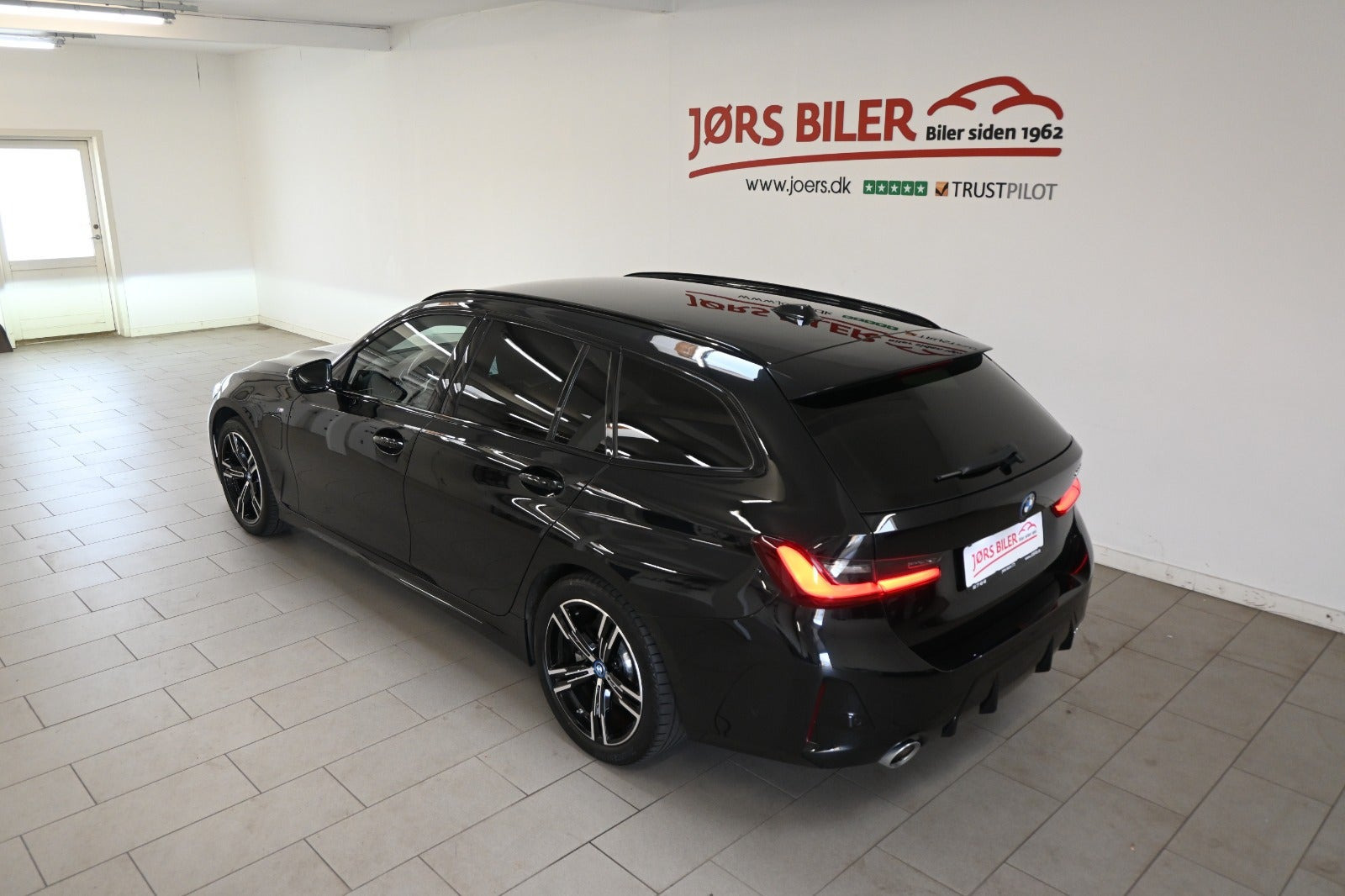 Sort BMW 320e fra 2024