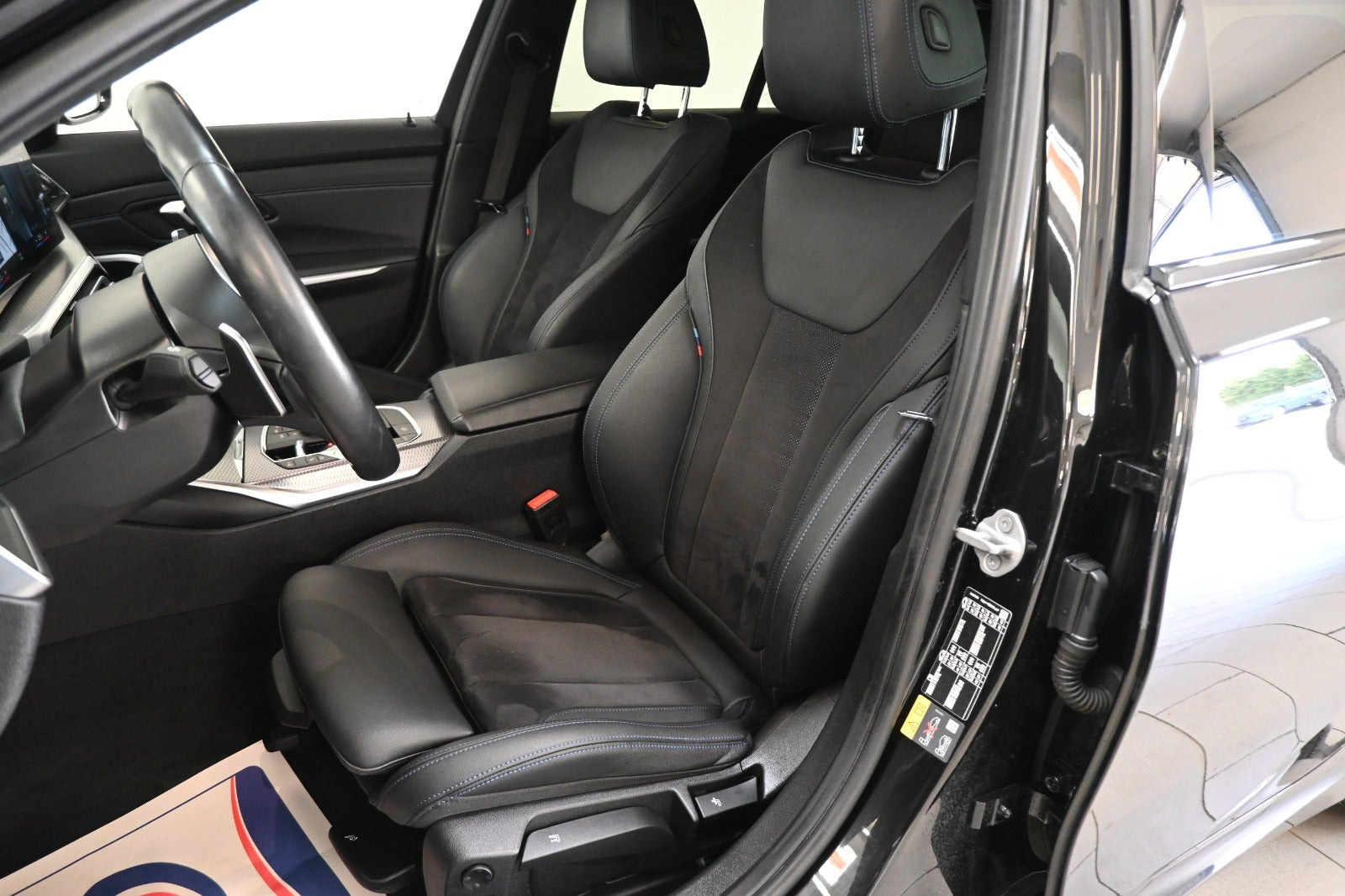 Sort BMW 320e fra 2024