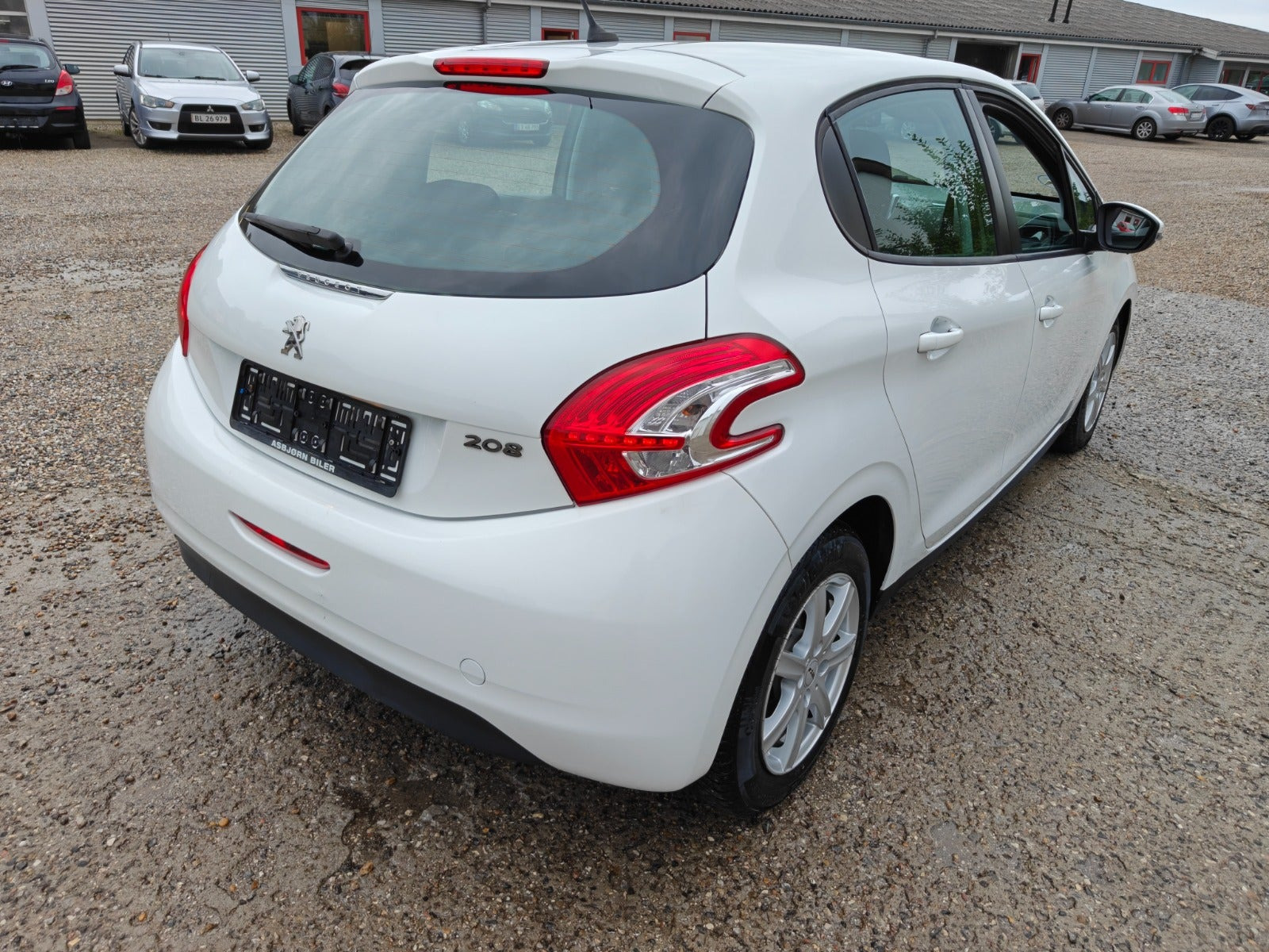 Gul Peugeot 208 fra 2014