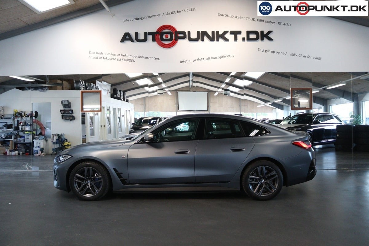 Orange BMW i4 fra 2024