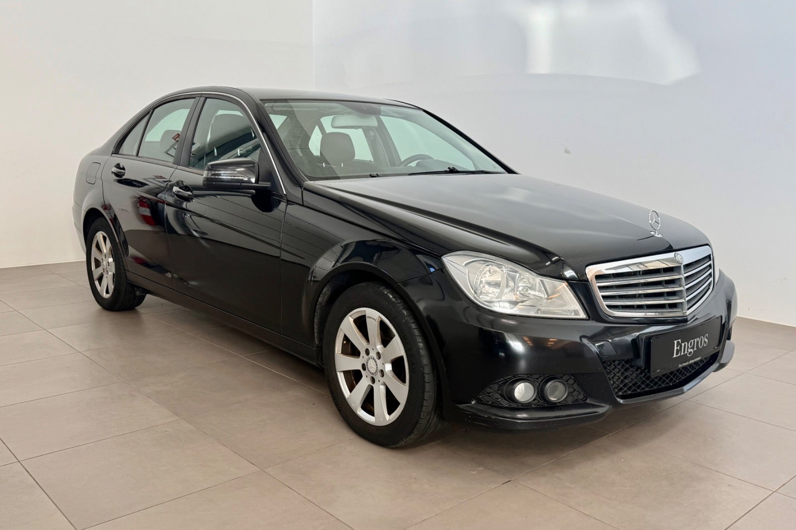 Grøn Mercedes C180 fra 2013