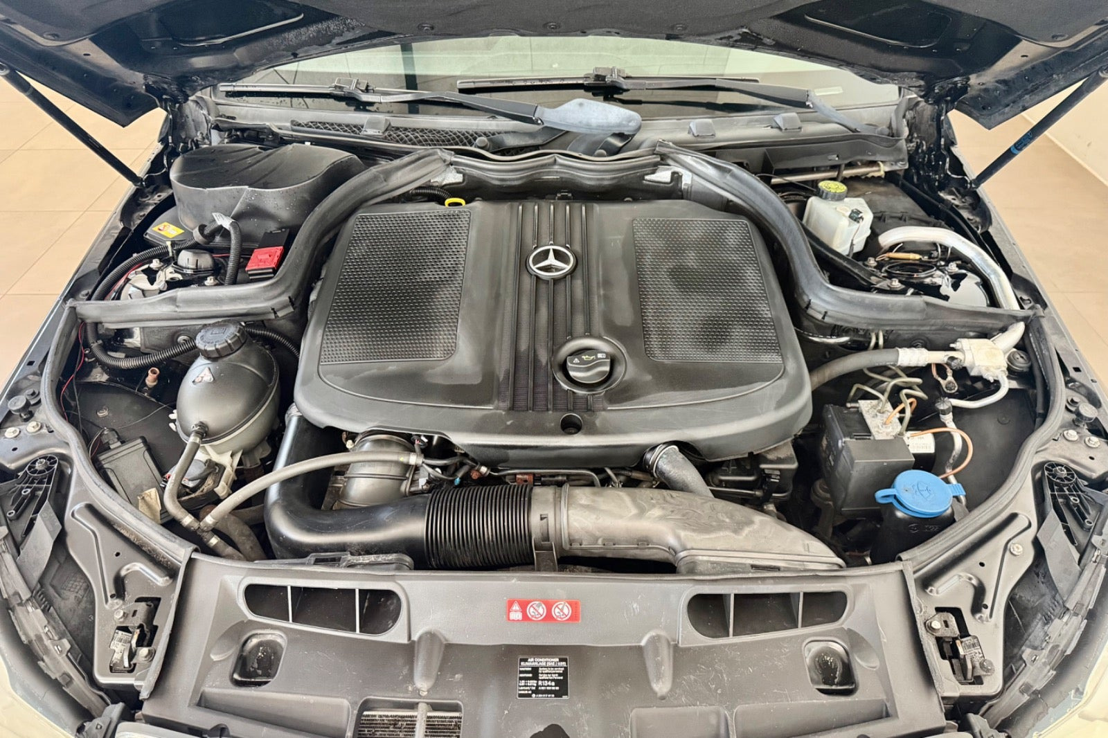 Grøn Mercedes C180 fra 2013