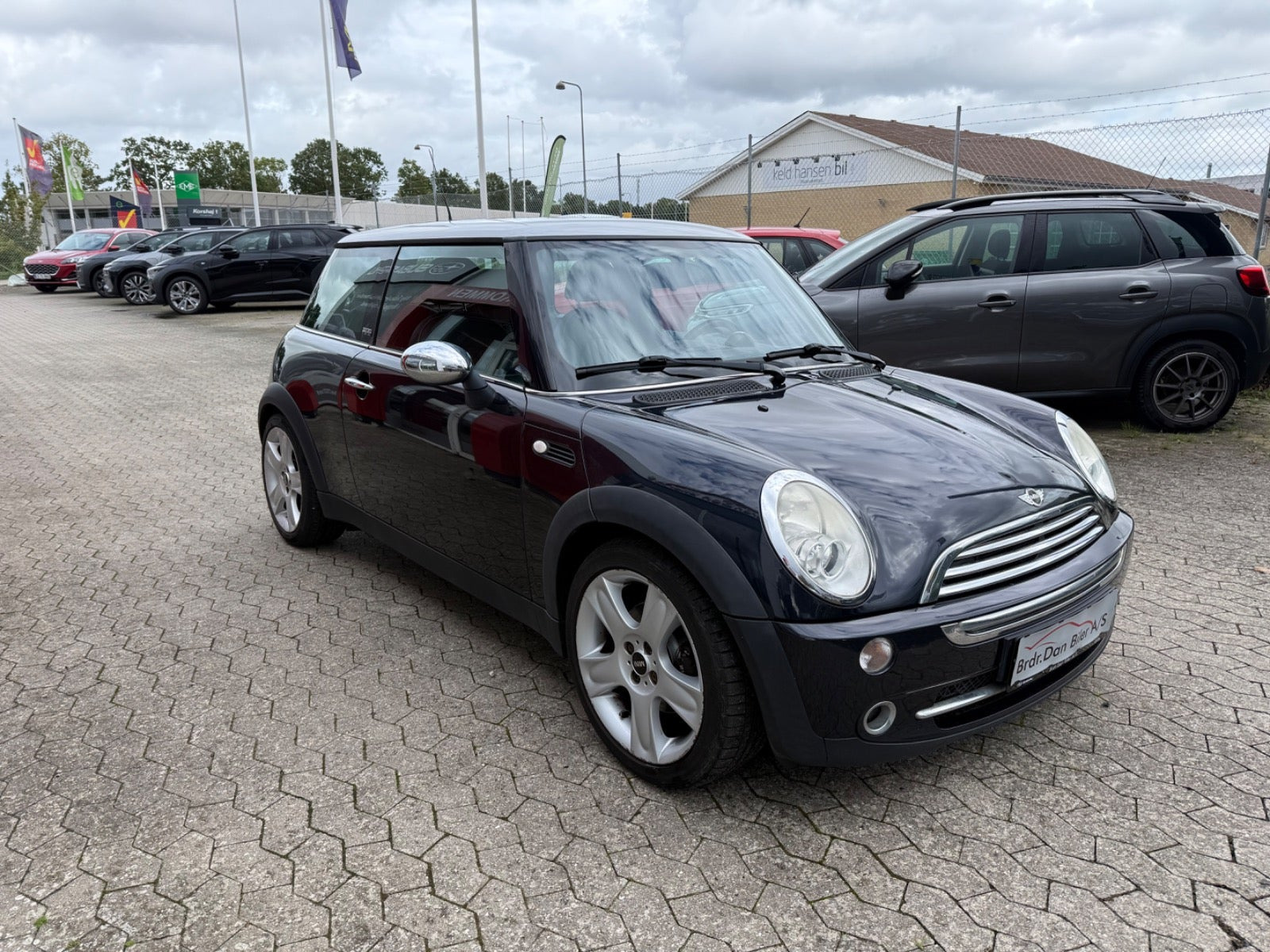 Blå Mini Cooper fra 2006