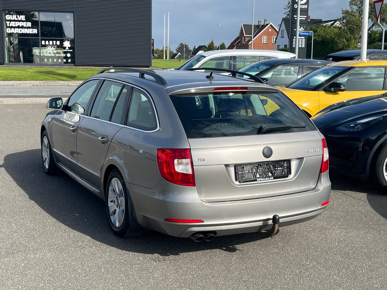 Beige Skoda Superb fra 2010