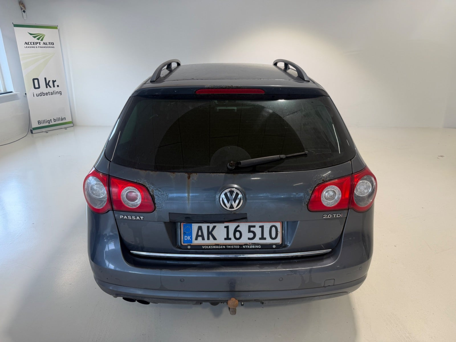 Grå VW Passat fra 2009
