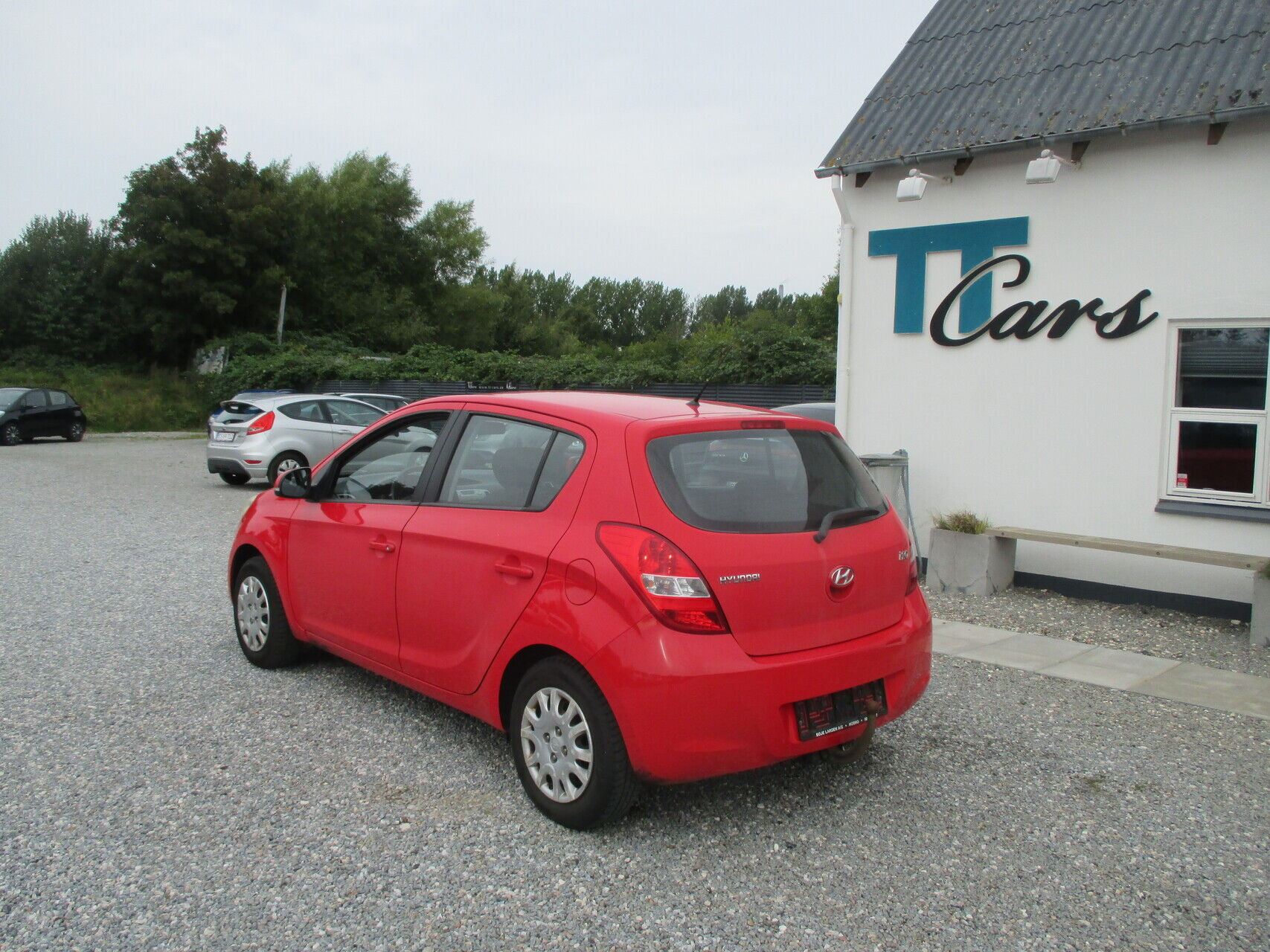 Rød Hyundai i20 fra 2011