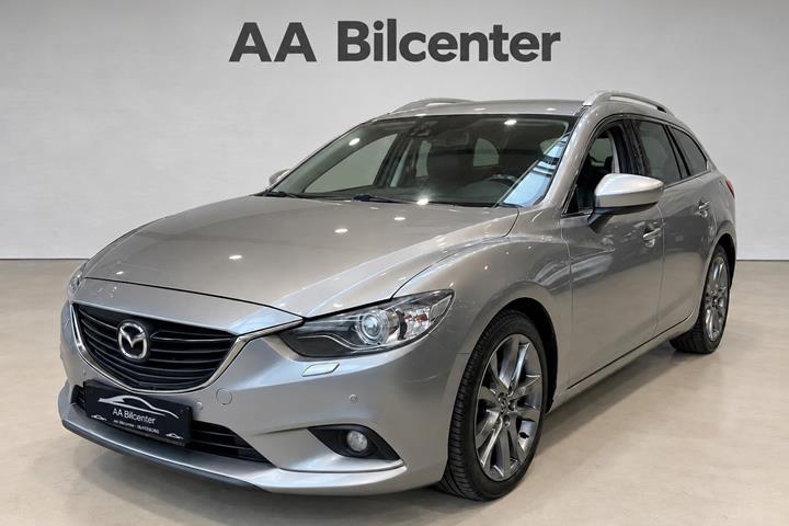 Grå Mazda 6 fra 2013 set udefra