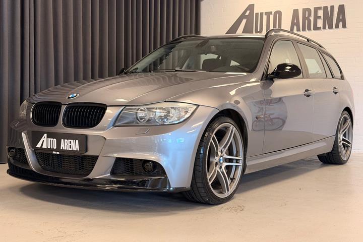 Grå BMW 335i fra 2009