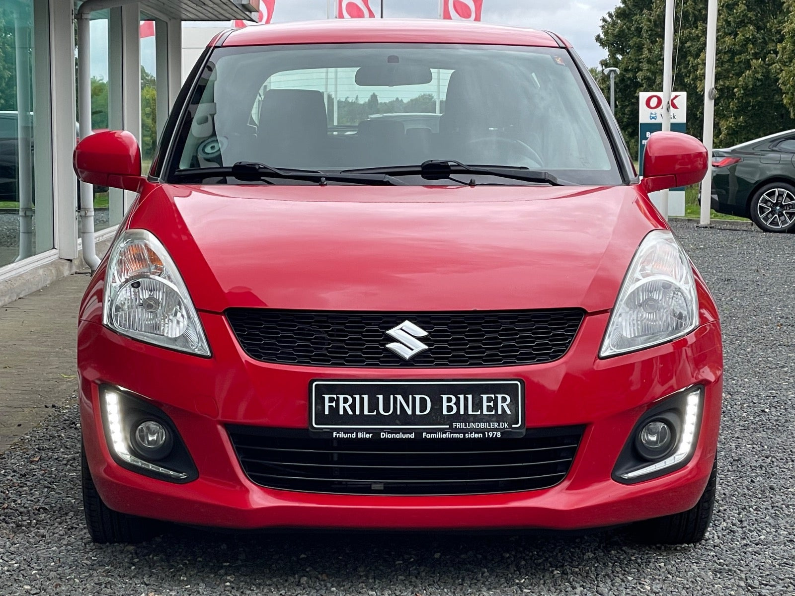 Rød Suzuki Swift fra 2014