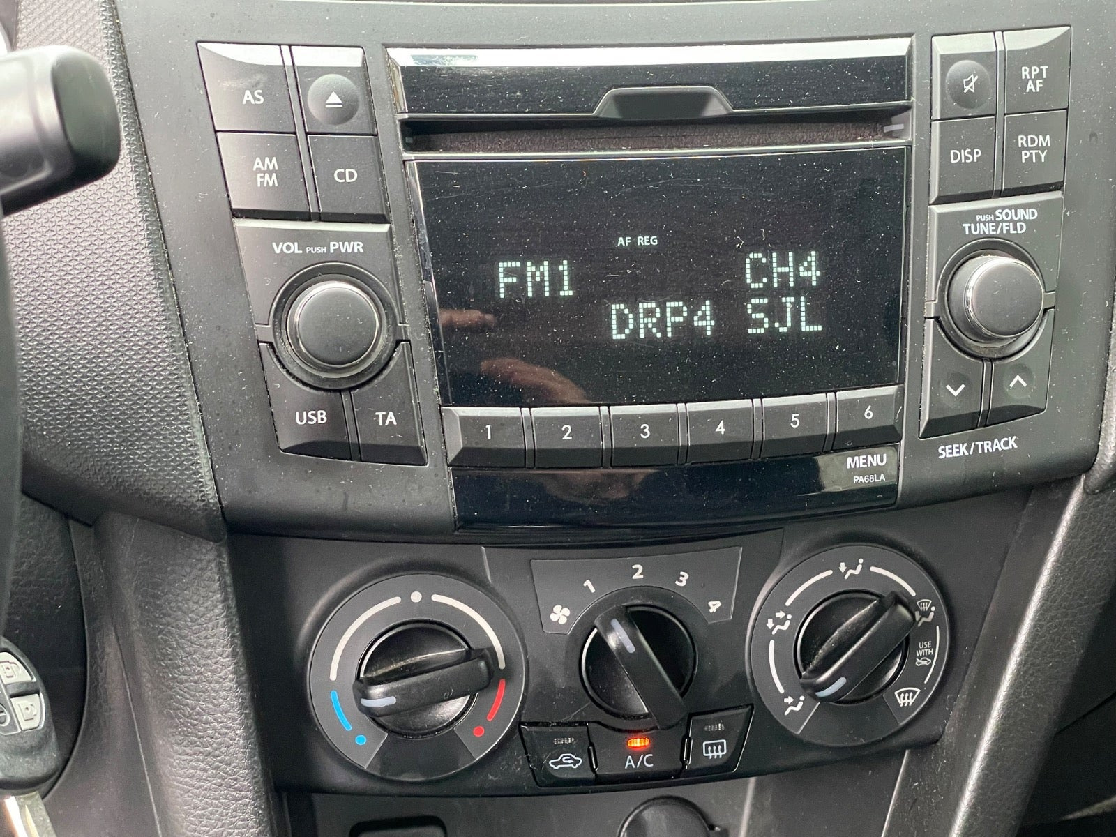 Rød Suzuki Swift fra 2014