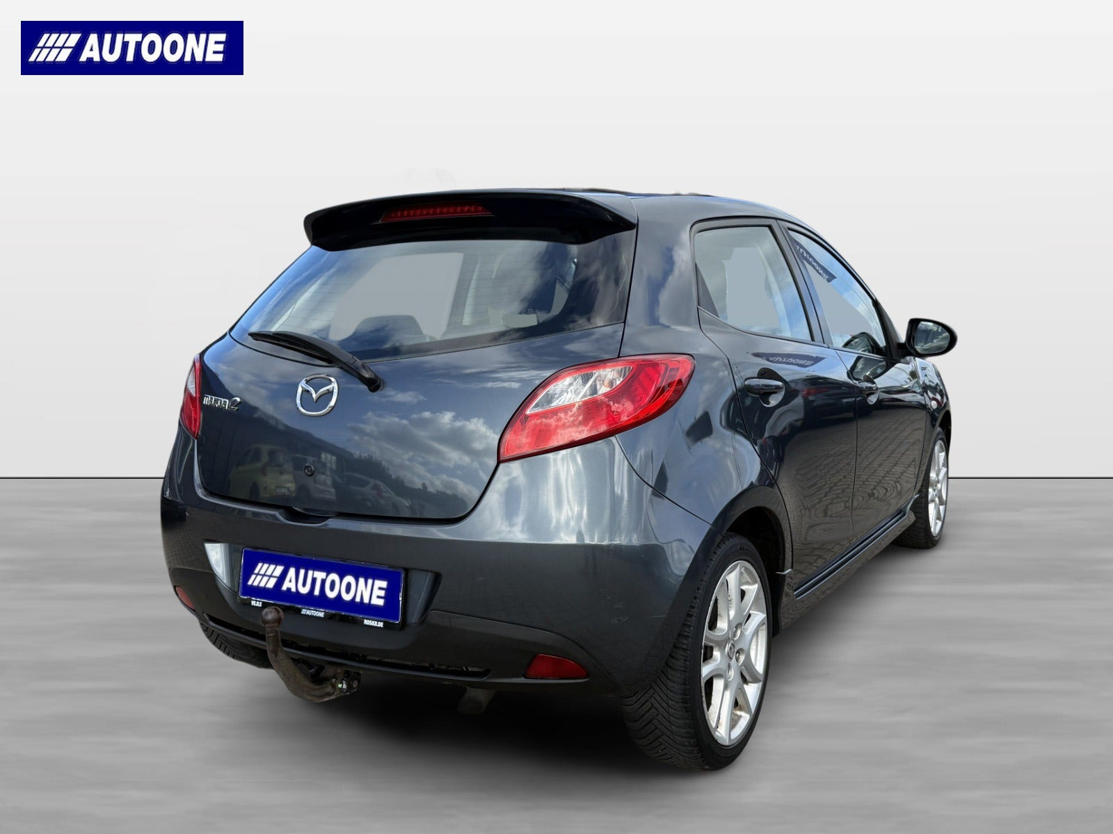 Grå Mazda 2 fra 2011