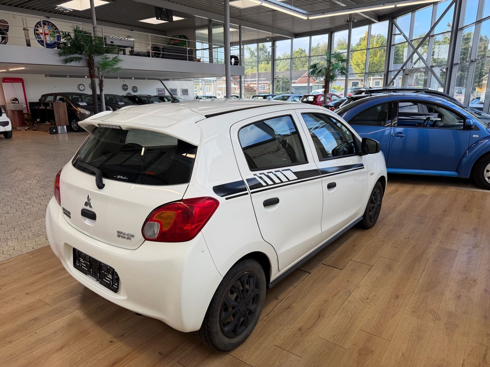 Hvid Mitsubishi Space Star fra 2014