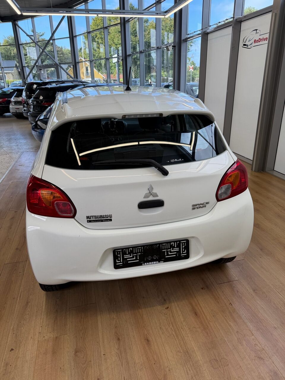 Hvid Mitsubishi Space Star fra 2014
