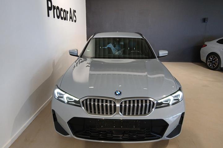 Grå BMW 320e fra 2024