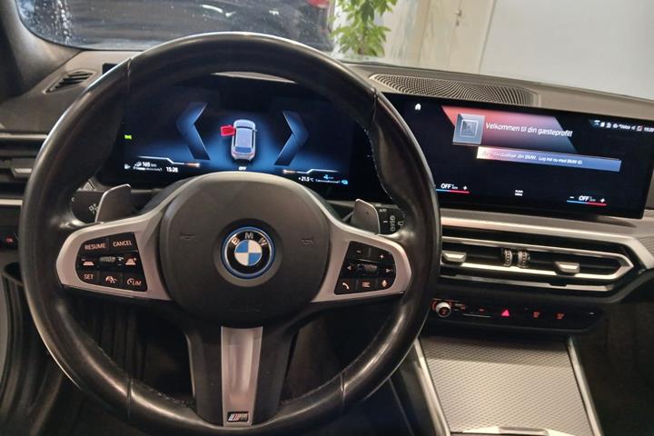 Grå BMW 320e fra 2024