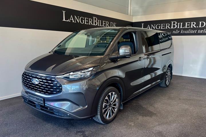 Grå Ford Tourneo Custom 340 L2 fra 2025 set udefra