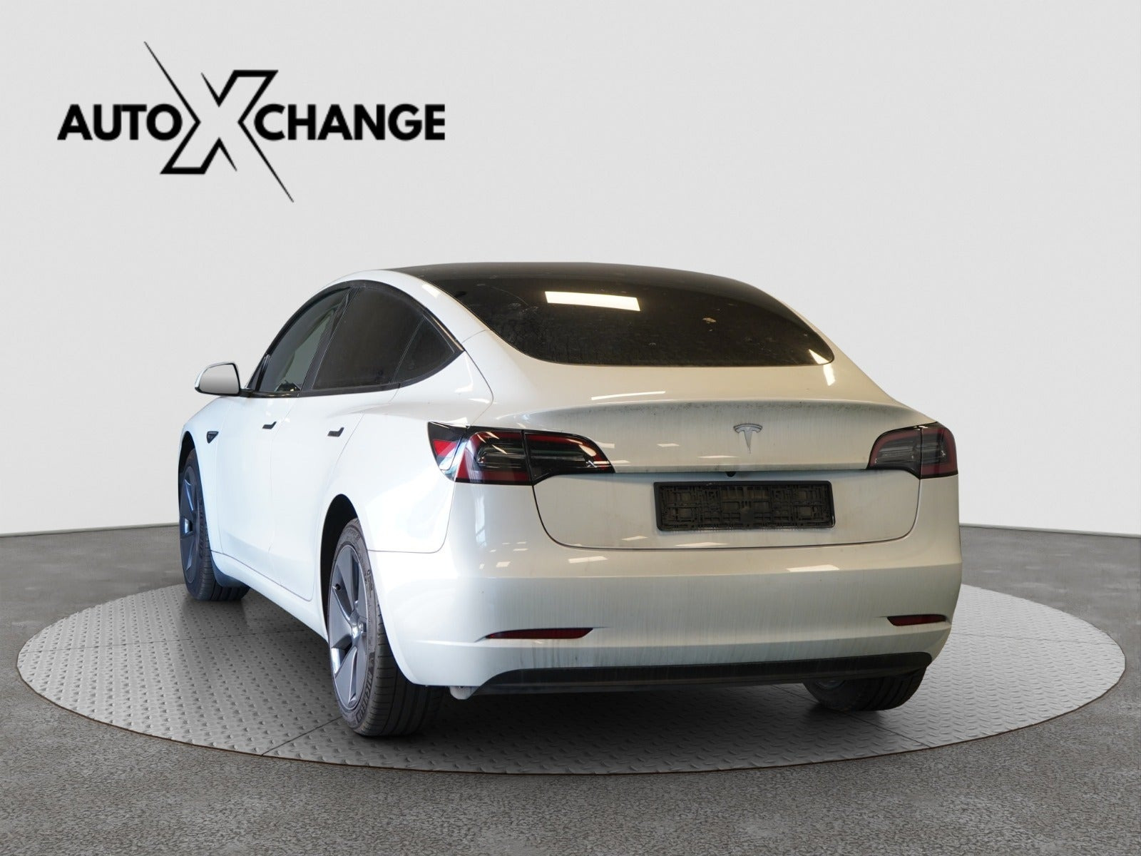 Hvid Tesla Model 3 fra 2023