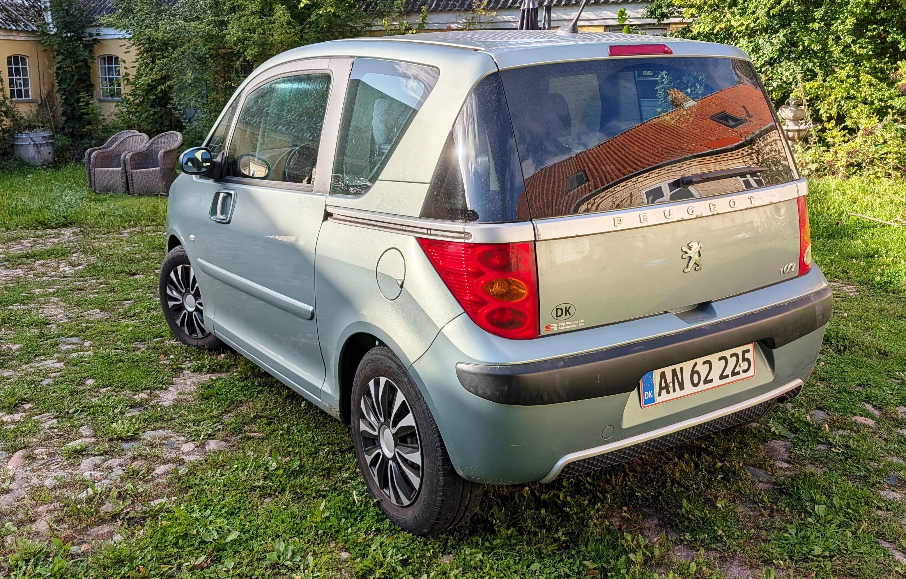 Turquoise Peugeot 1007 fra 2006