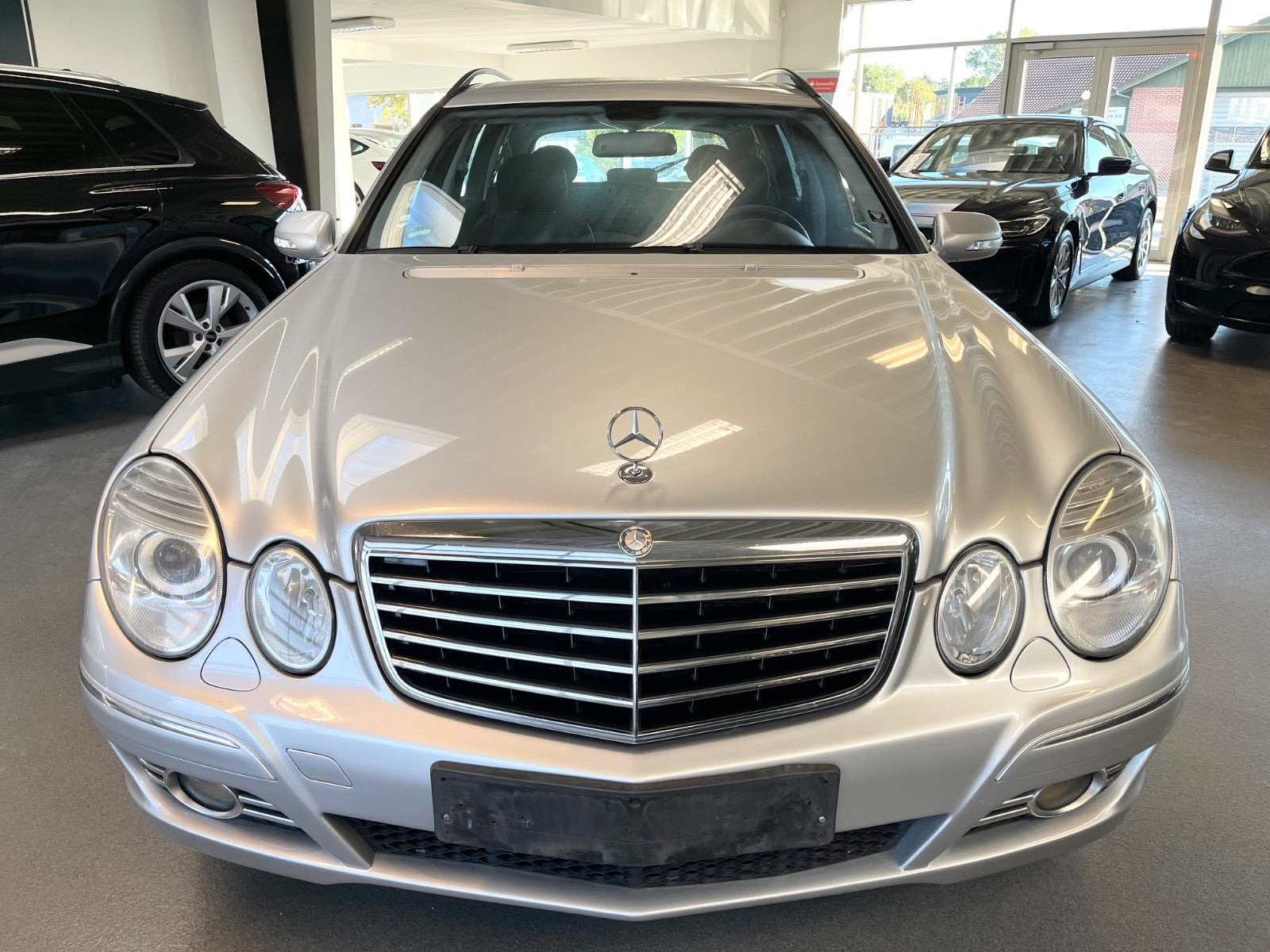 Sølv Mercedes E320 fra 2007