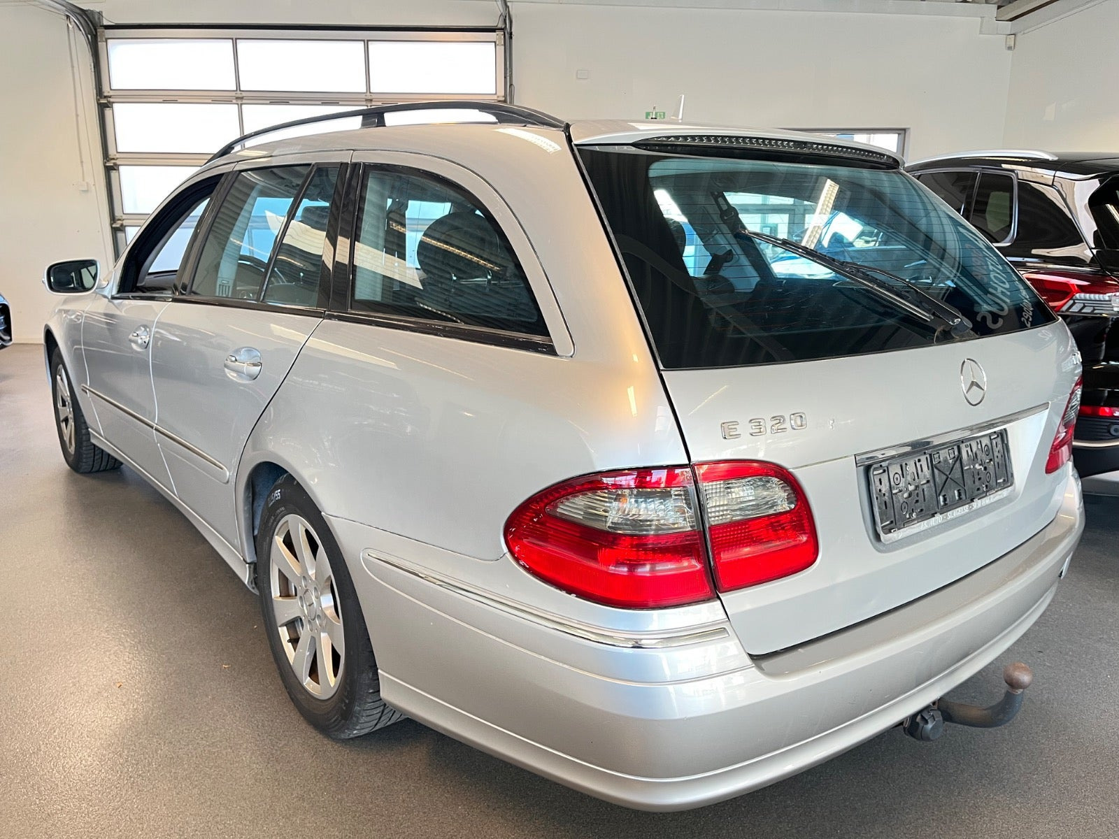 Sølv Mercedes E320 fra 2007