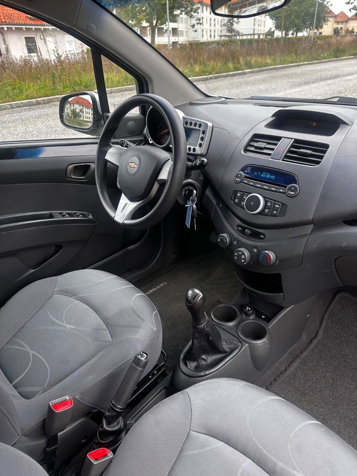 Sølv Chevrolet Spark fra 2011