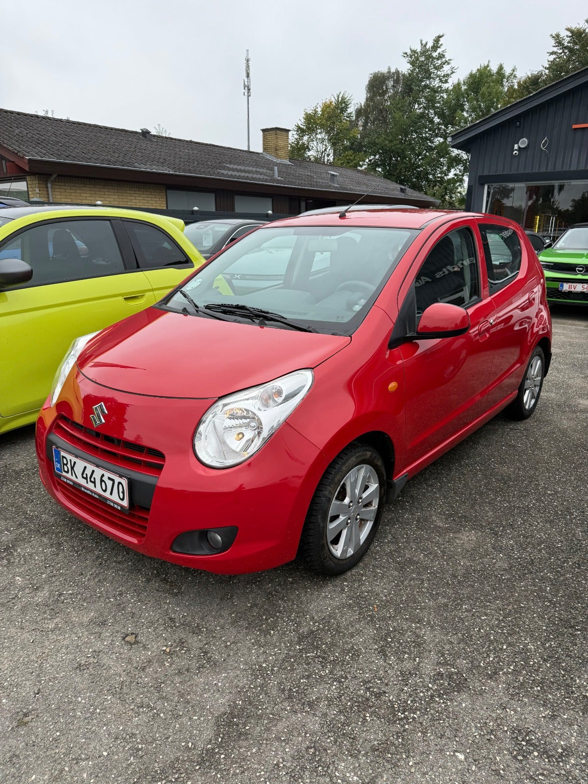 Rød Suzuki Alto fra 2013