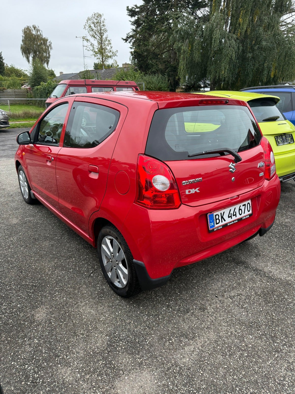 Rød Suzuki Alto fra 2013