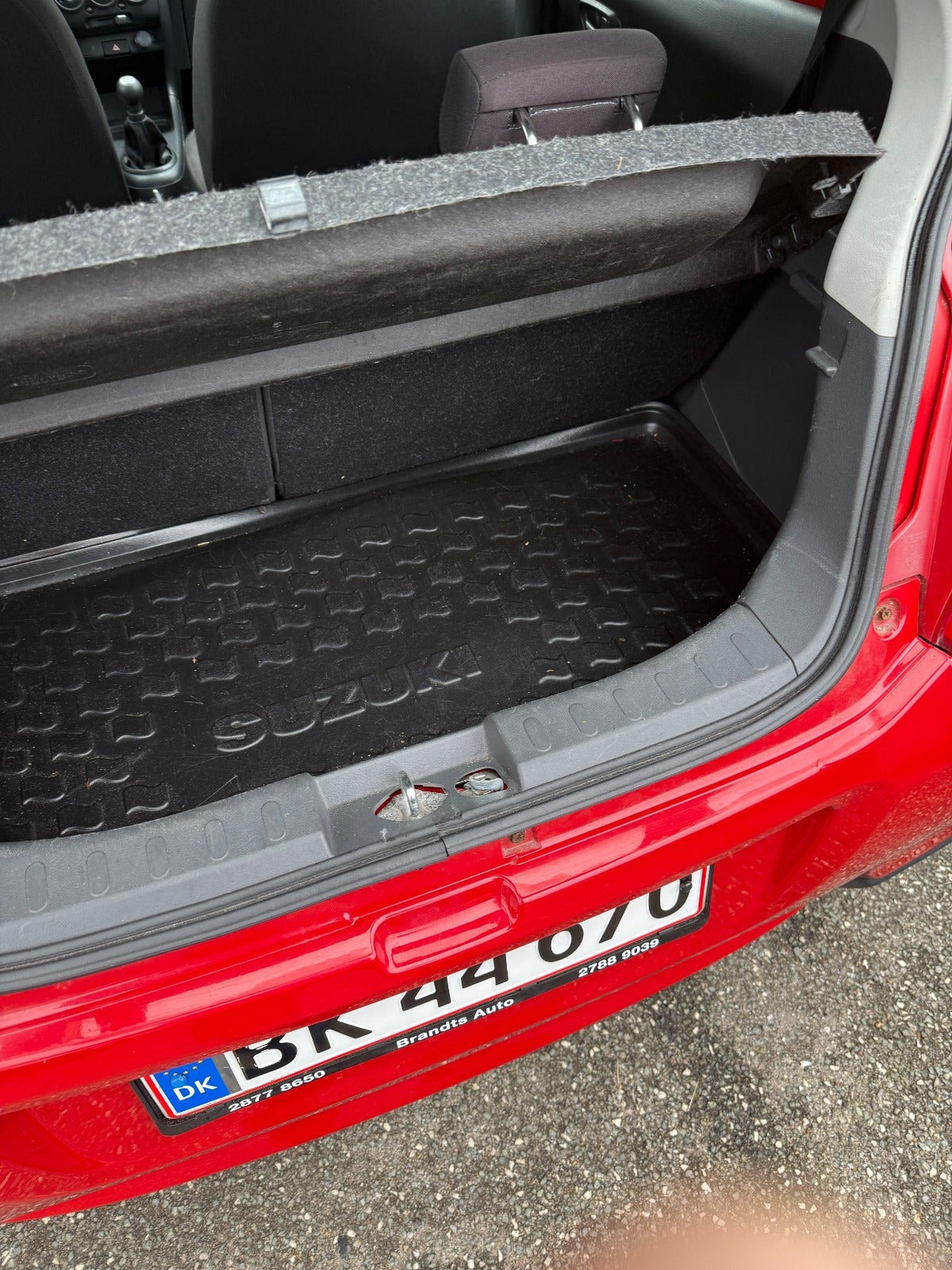 Rød Suzuki Alto fra 2013