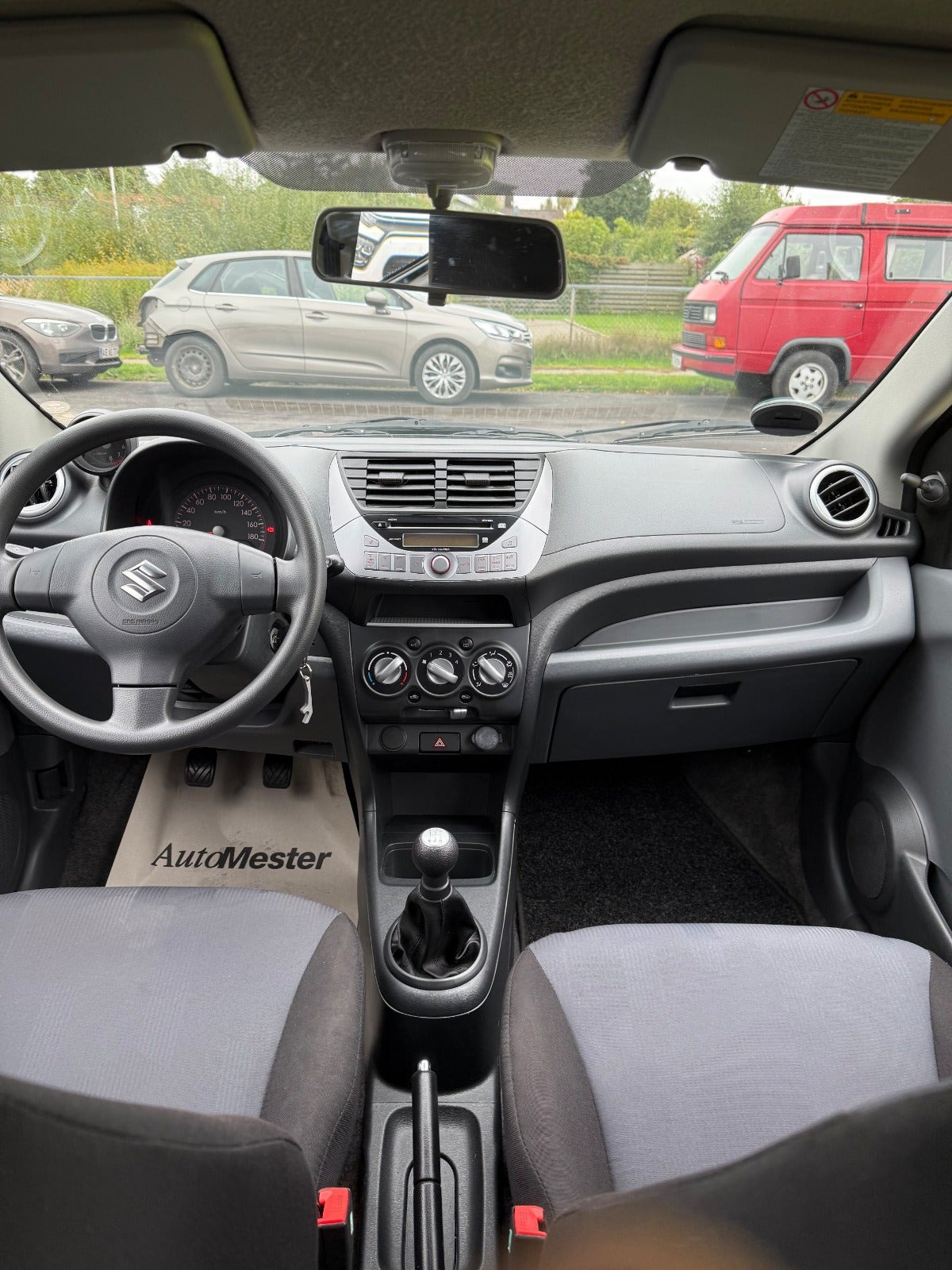 Rød Suzuki Alto fra 2013