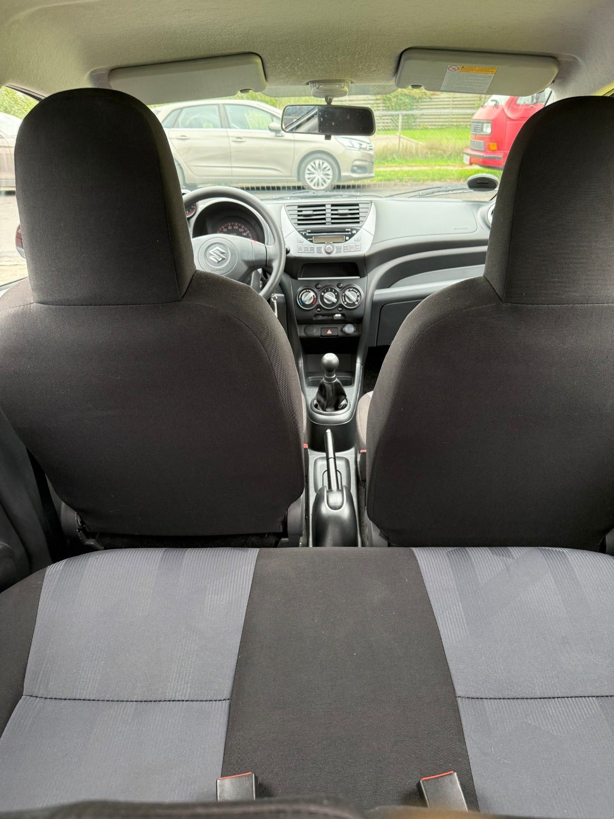 Rød Suzuki Alto fra 2013