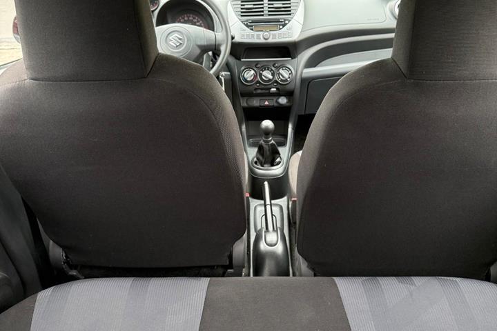 Rød Suzuki Alto fra 2013