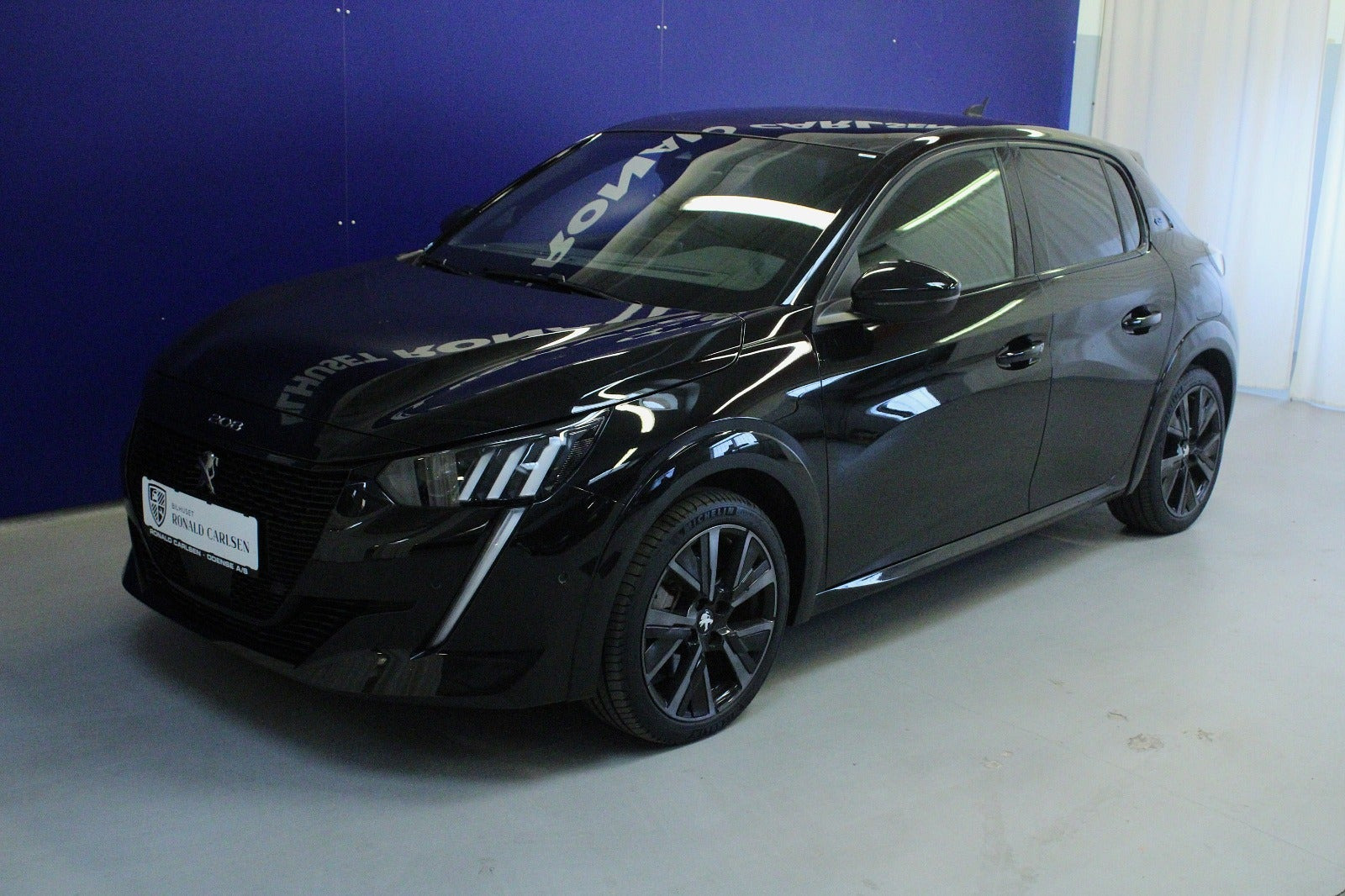 Sort Peugeot e-208 fra 2023