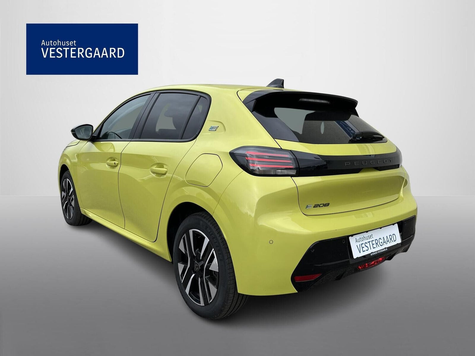 Gul Peugeot e-208 fra 2024