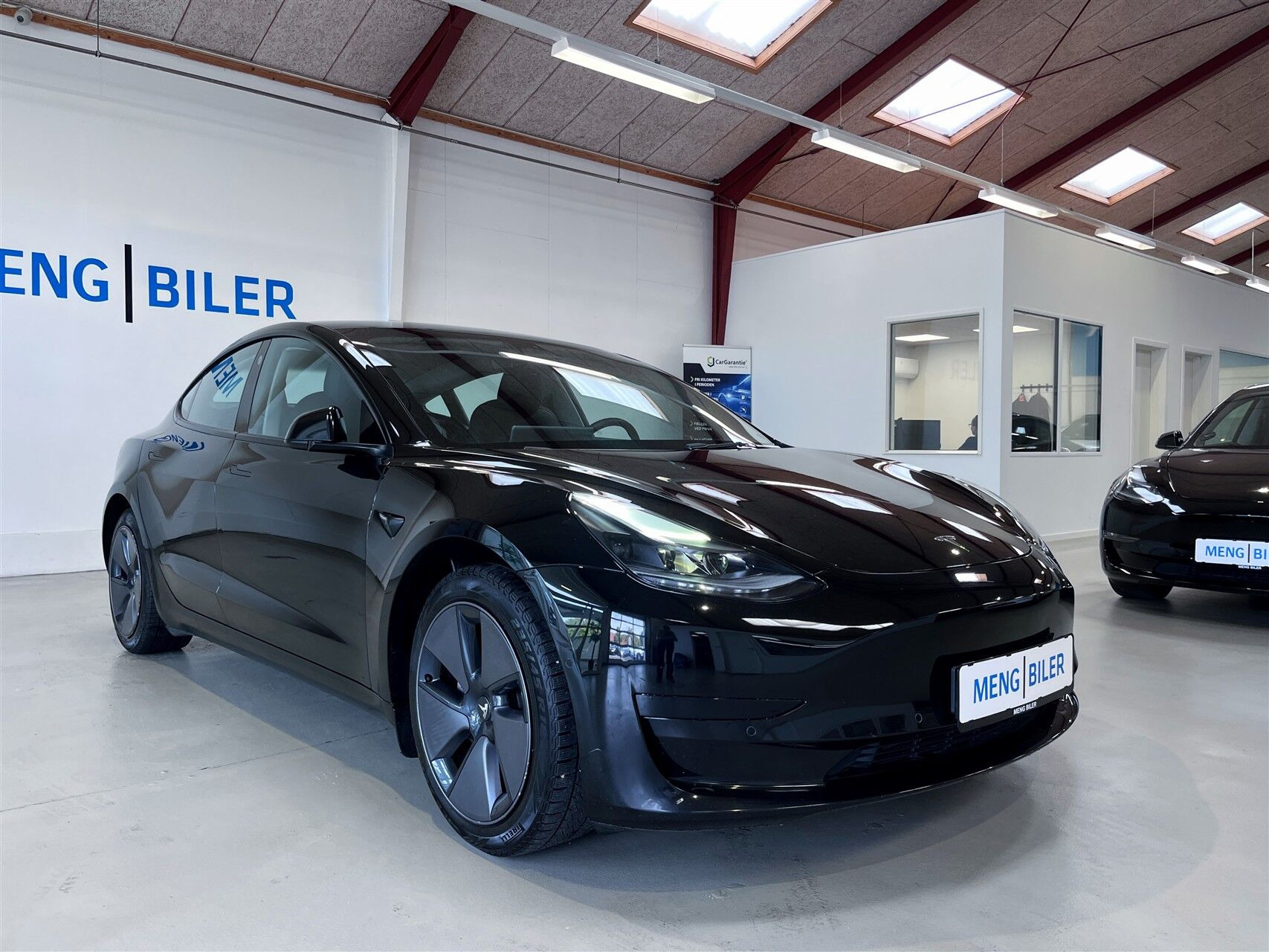 Sort Tesla Model 3 fra 2023