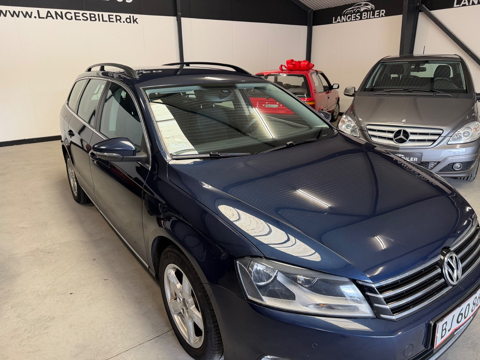 Blå VW Passat fra 2014