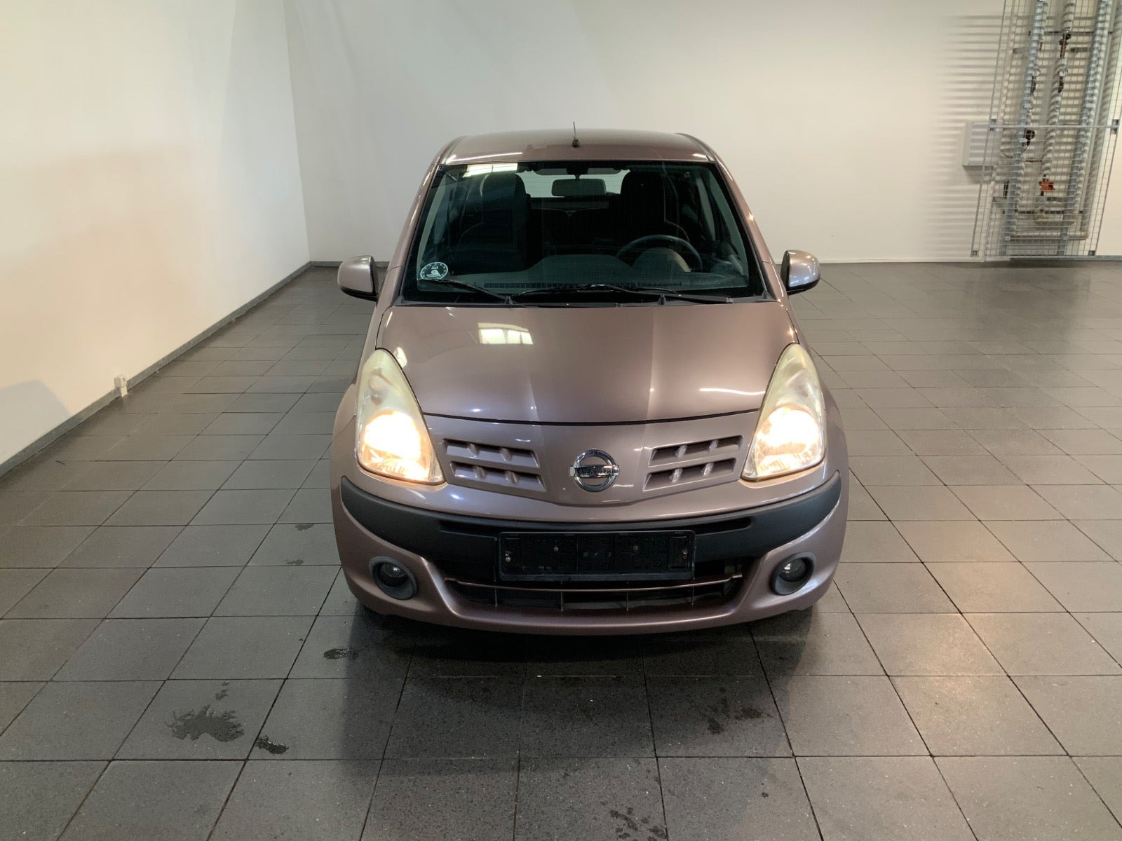 Gul Nissan Pixo fra 2010