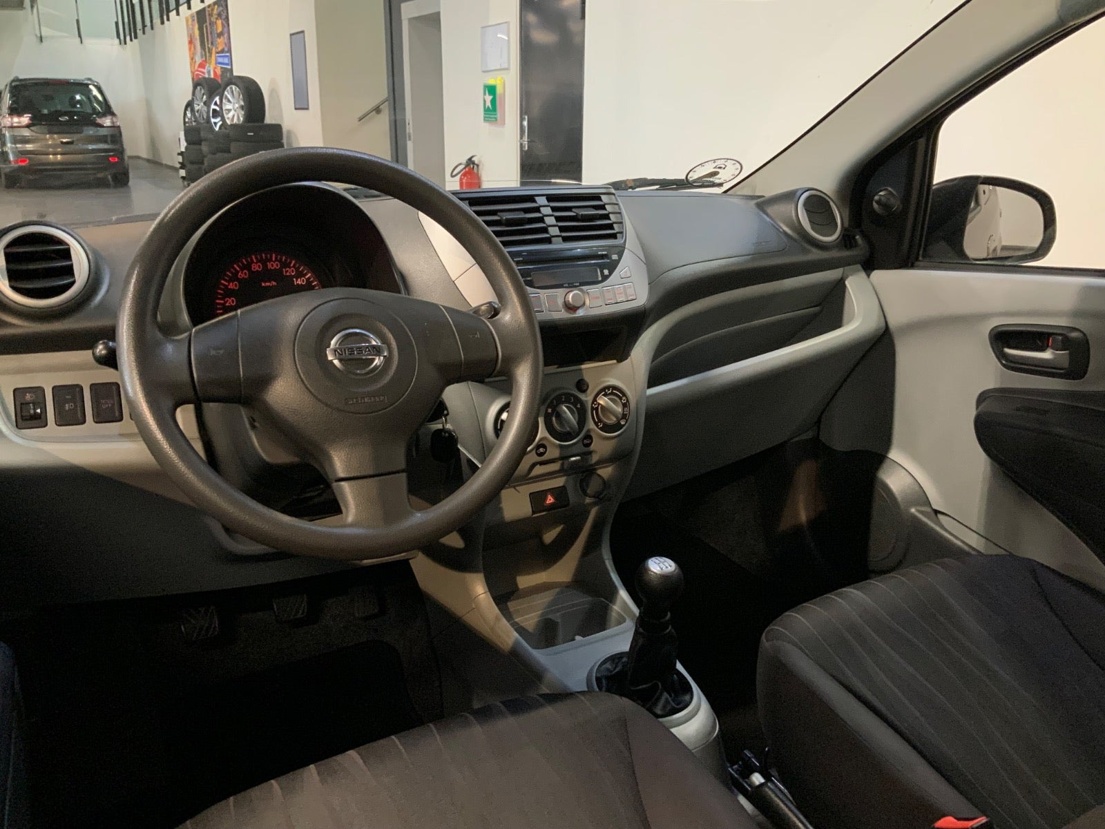 Gul Nissan Pixo fra 2010