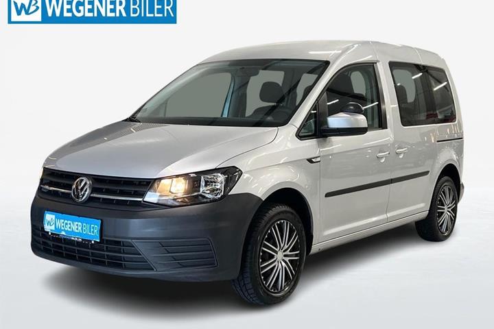 Sølv VW Caddy fra 2016 set udefra