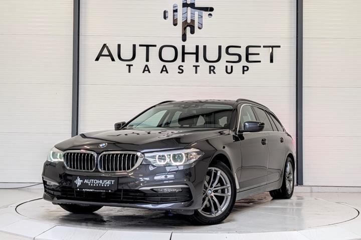 Grå BMW 520i fra 2019