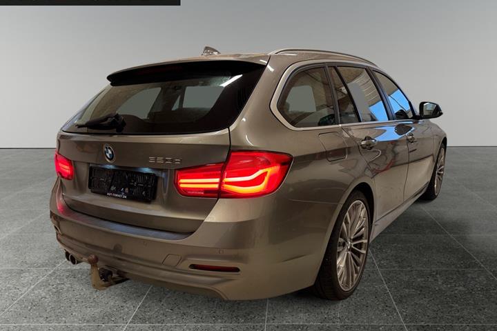 Beige BMW 320d fra 2019