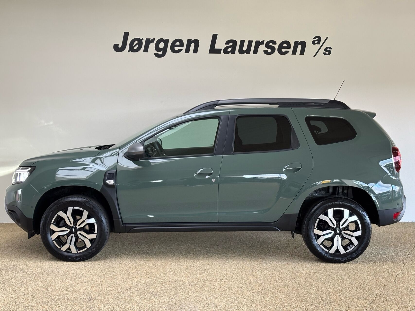 Grøn Dacia Duster fra 2023