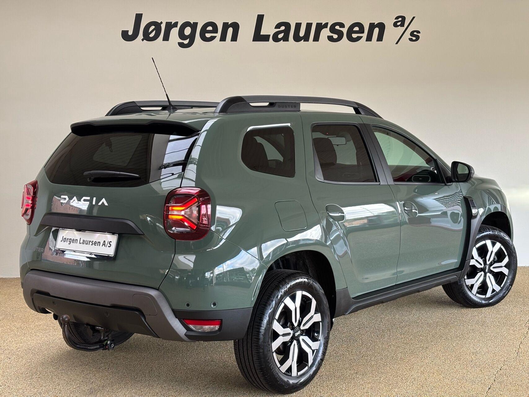 Grøn Dacia Duster fra 2023