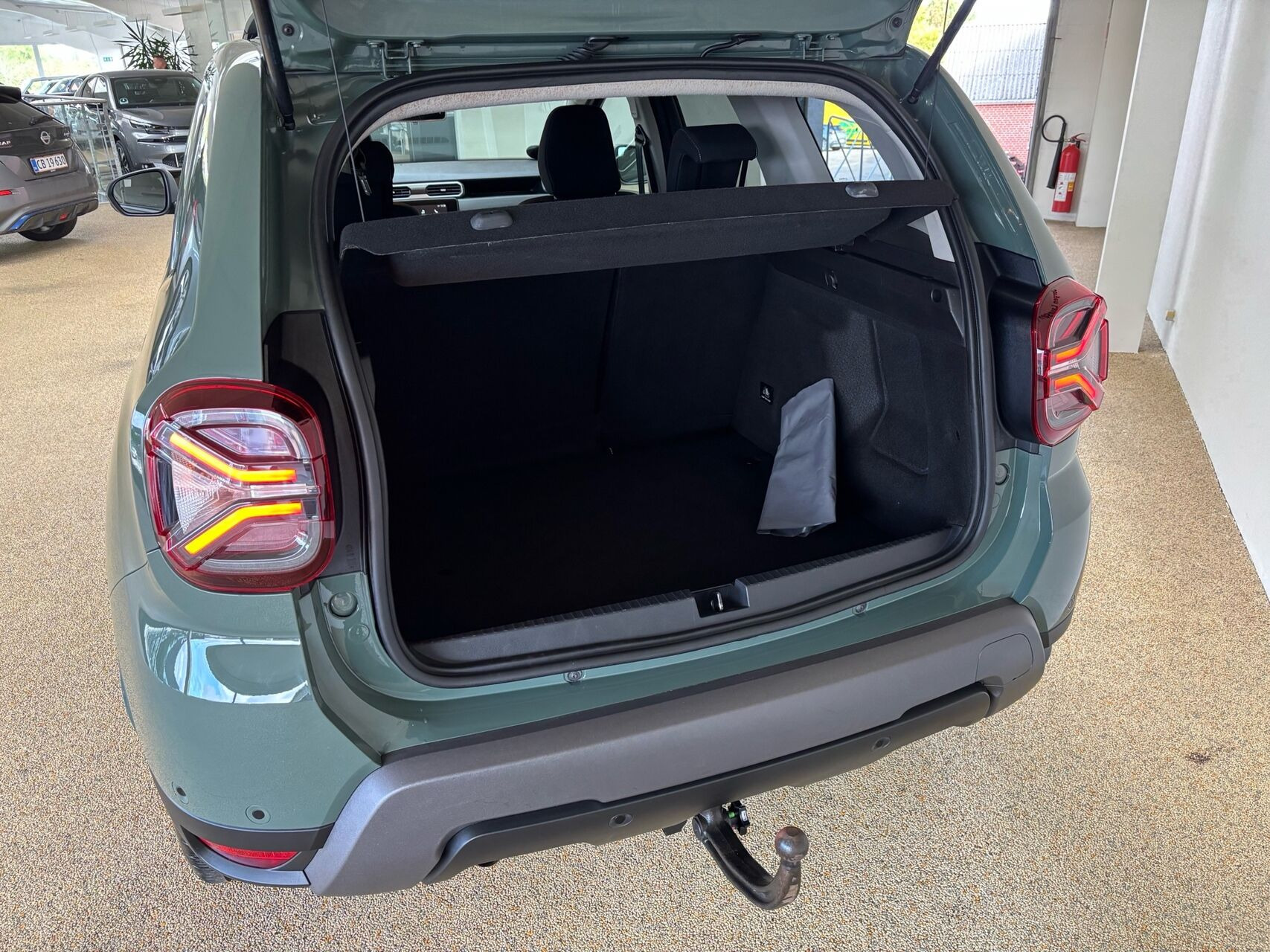 Grøn Dacia Duster fra 2023